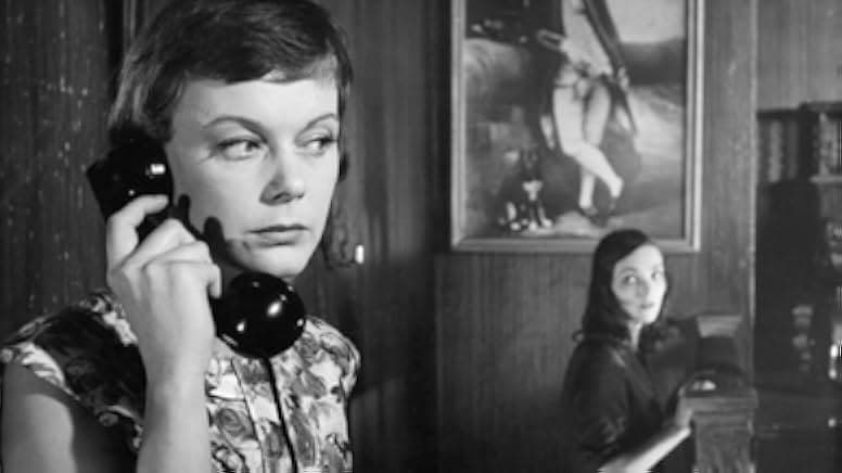 Damen i svart 1958